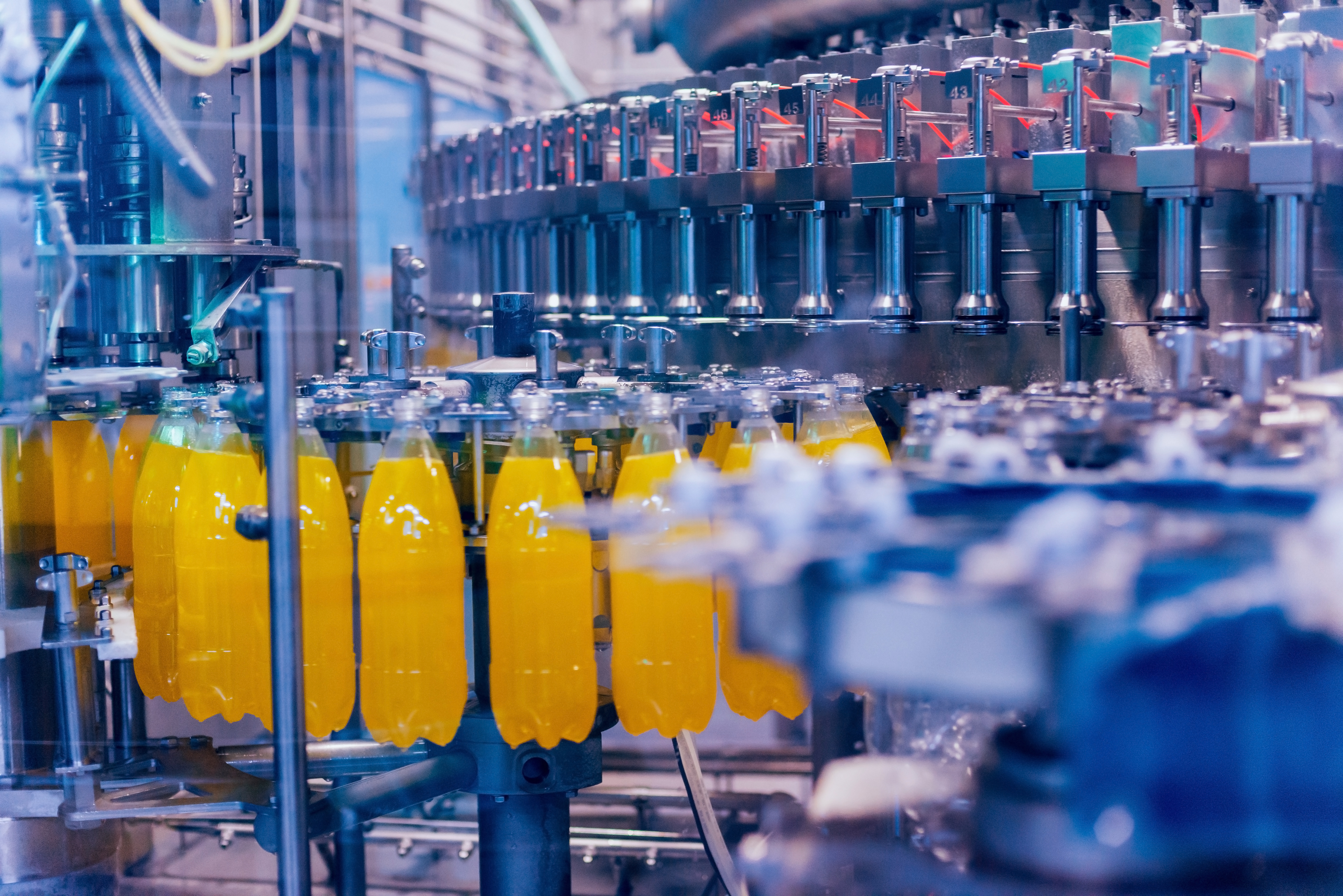 Industrial facilities bottling yellow beverage