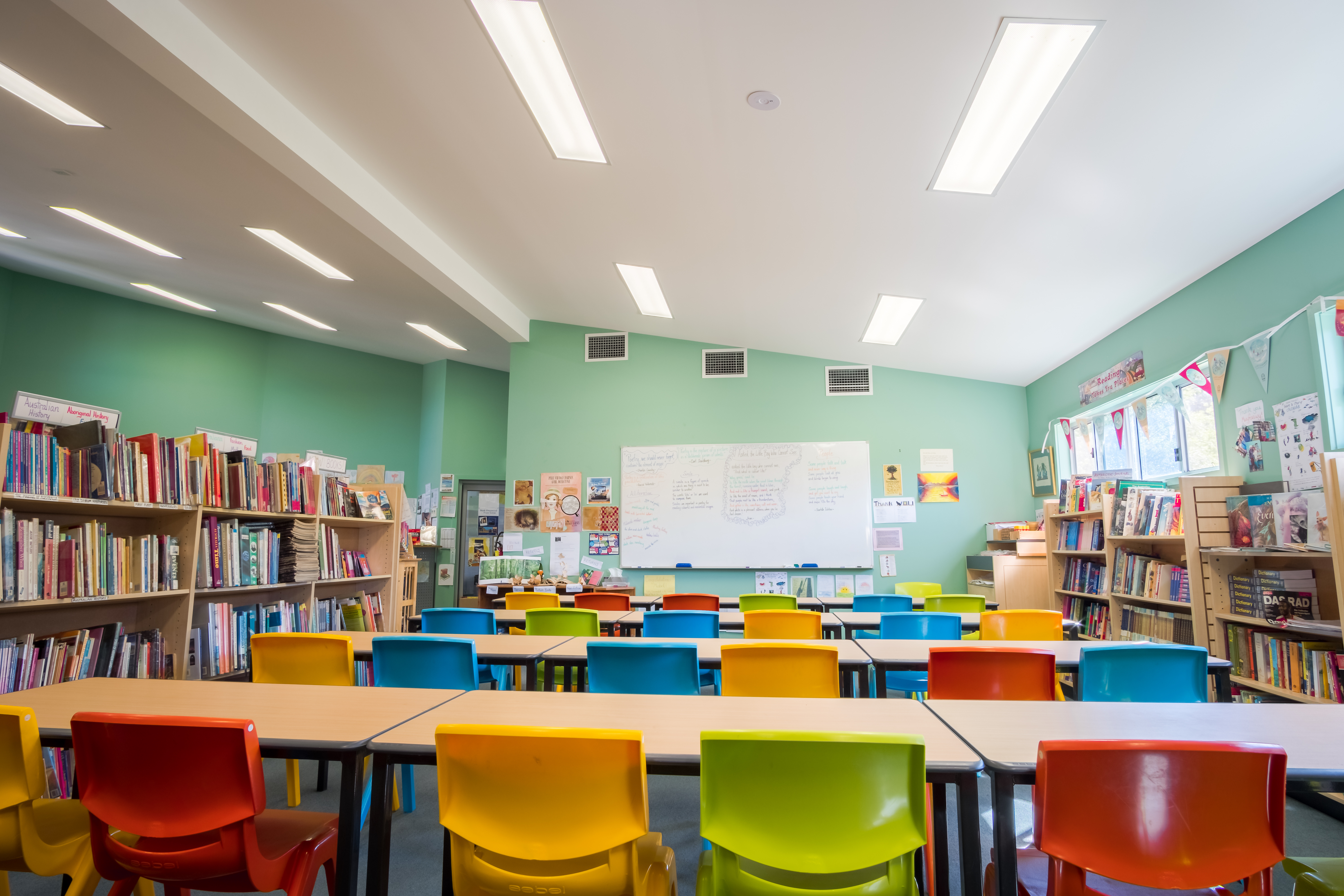 Classroom with desks and colorful chairs