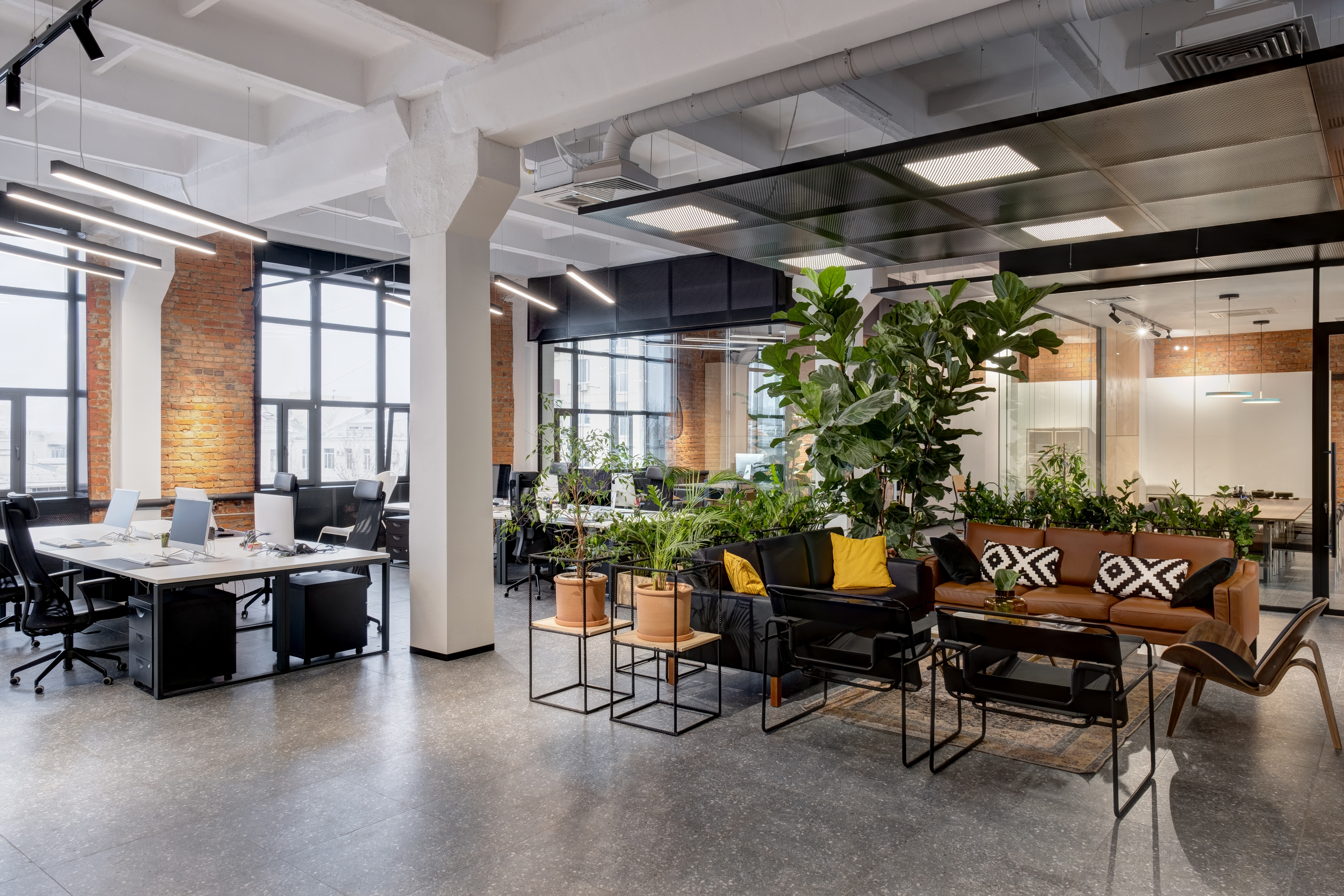 Modern building interior with flexible seating and plants