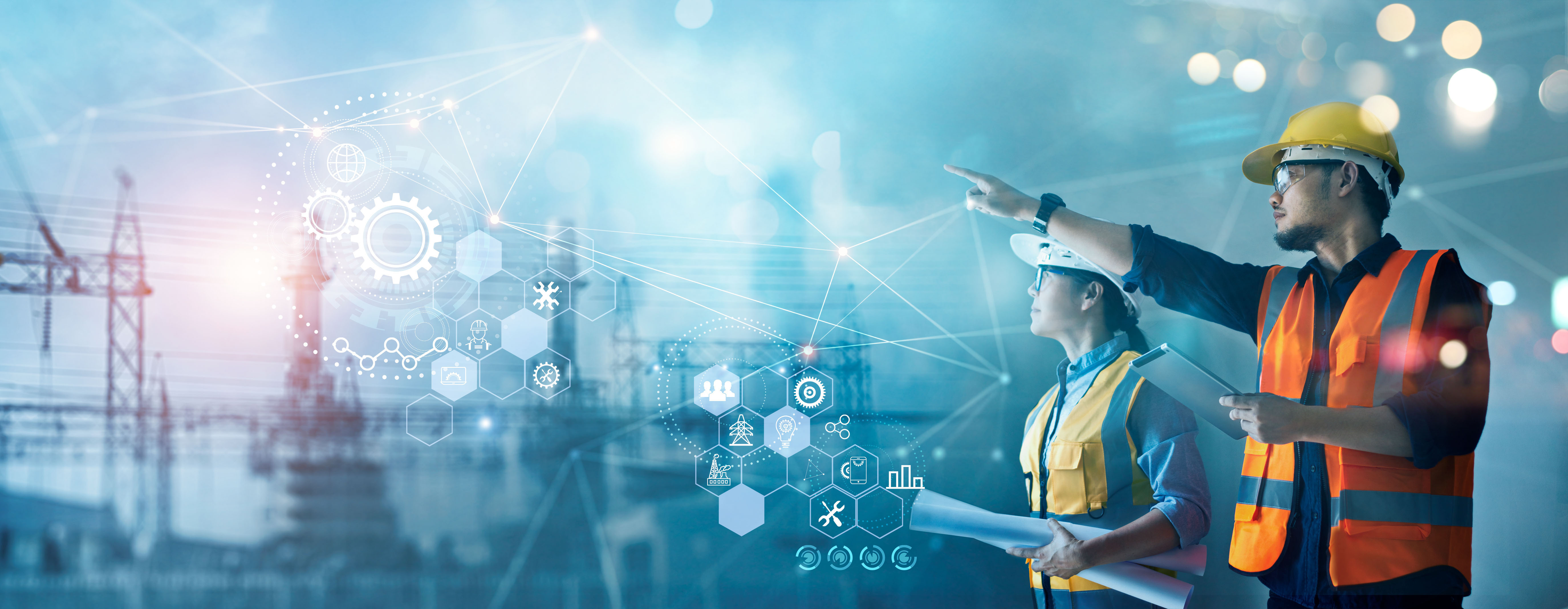 Engineers pointing to digitized energy infrastructure